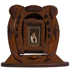 Miniature tramp art horseshoe frame
