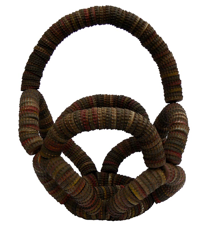 Sculptural looking bottle cap basket with good form, color, and size