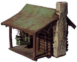 Miniature log cabin