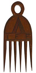 Hand carved wooden comb