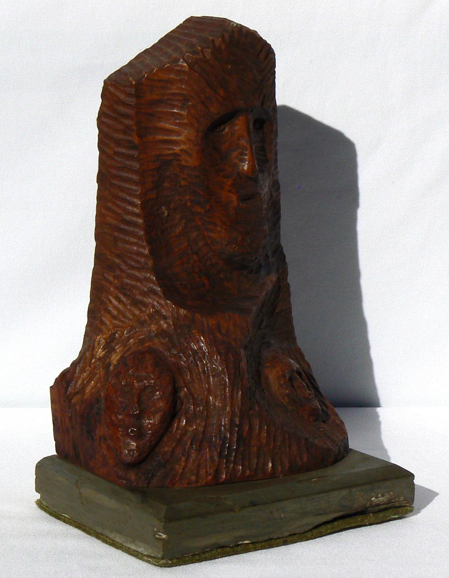 Carved bust on stone base