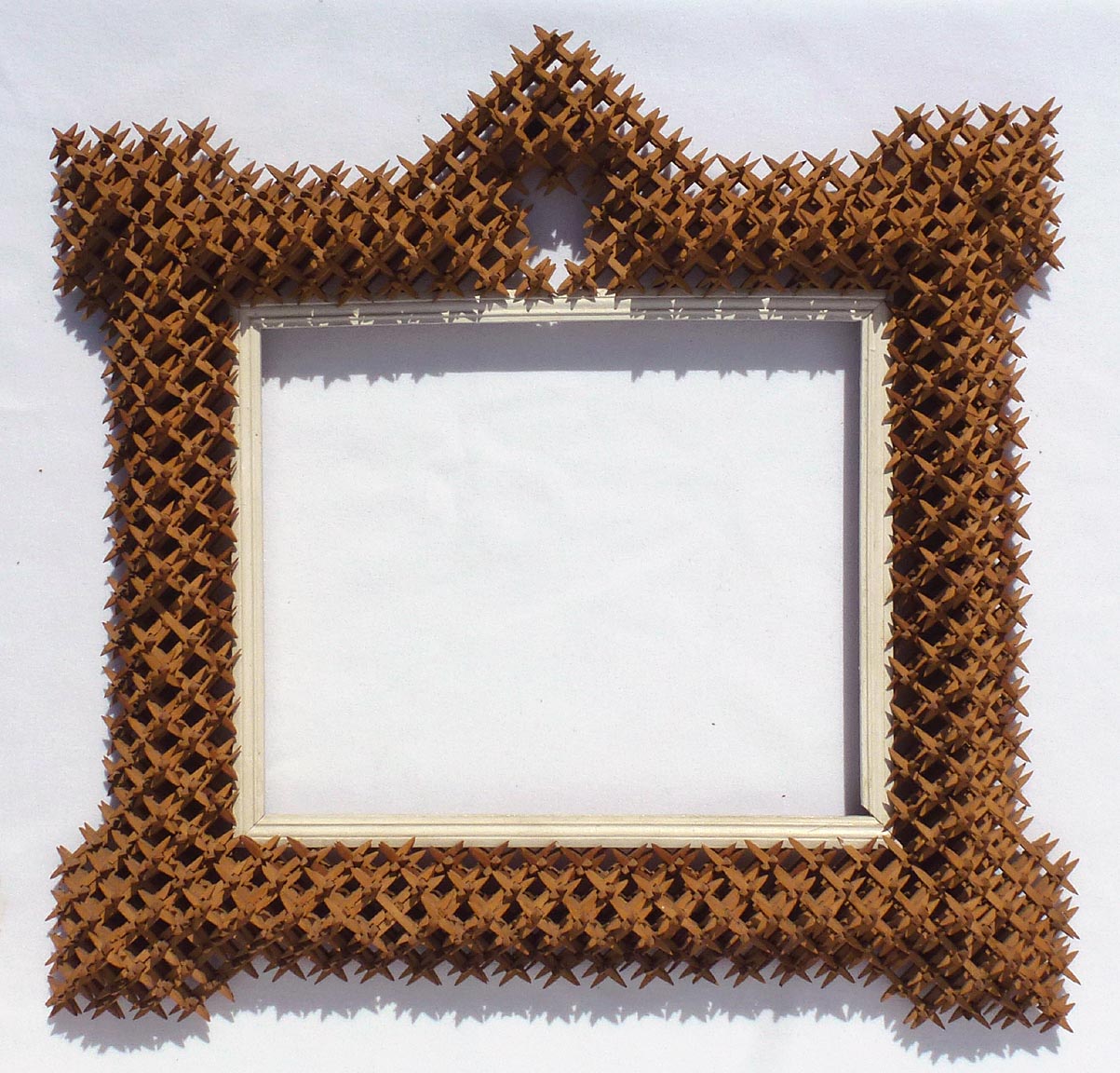 Crown of thorns tramp art frame