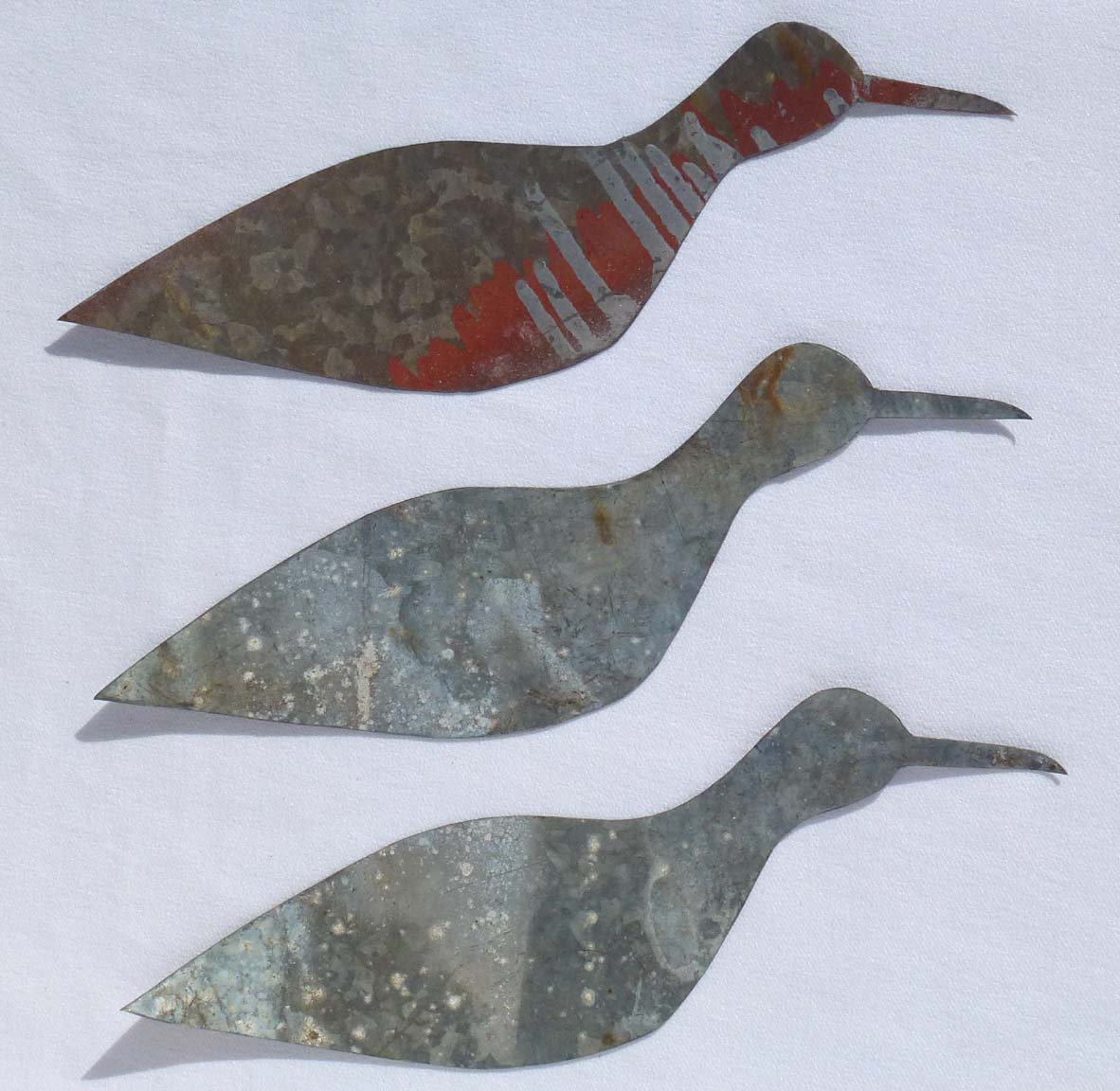 Three metal birds