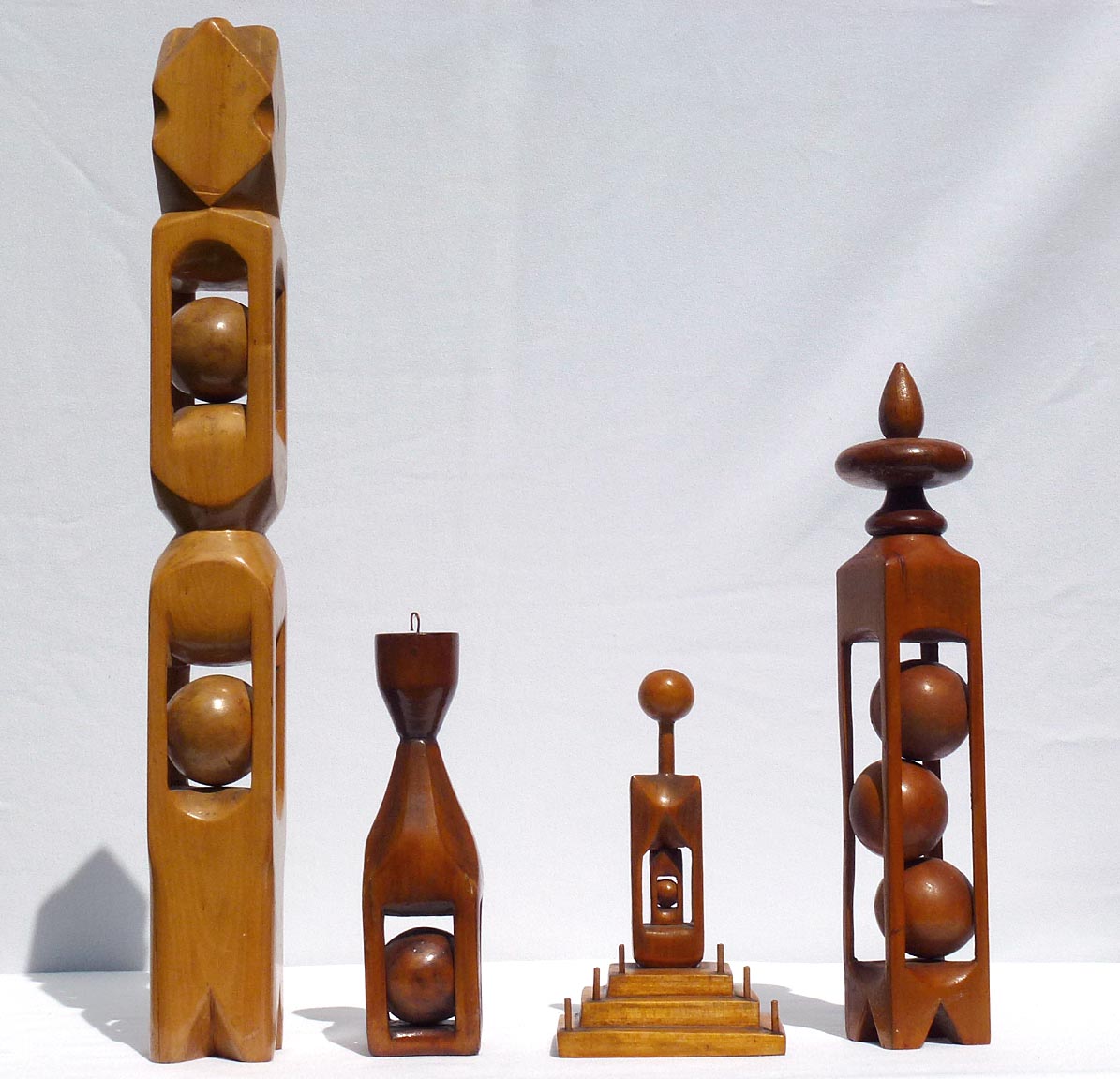 Four whimsy carvings by the same maker