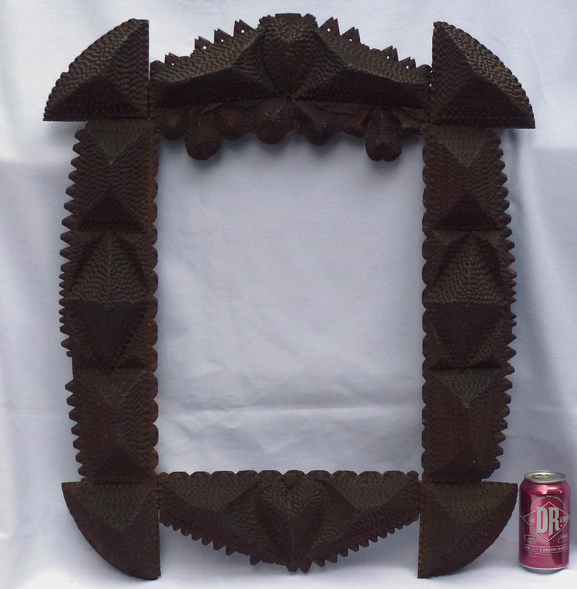 Large tramp art frame with hearts, carved fruit