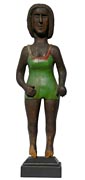 Folk art carving of a woman