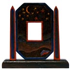 Carved moon and stars frame