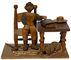 Carved man and dog