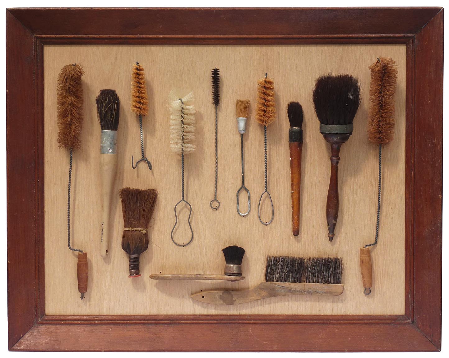 Framed collection of brushes