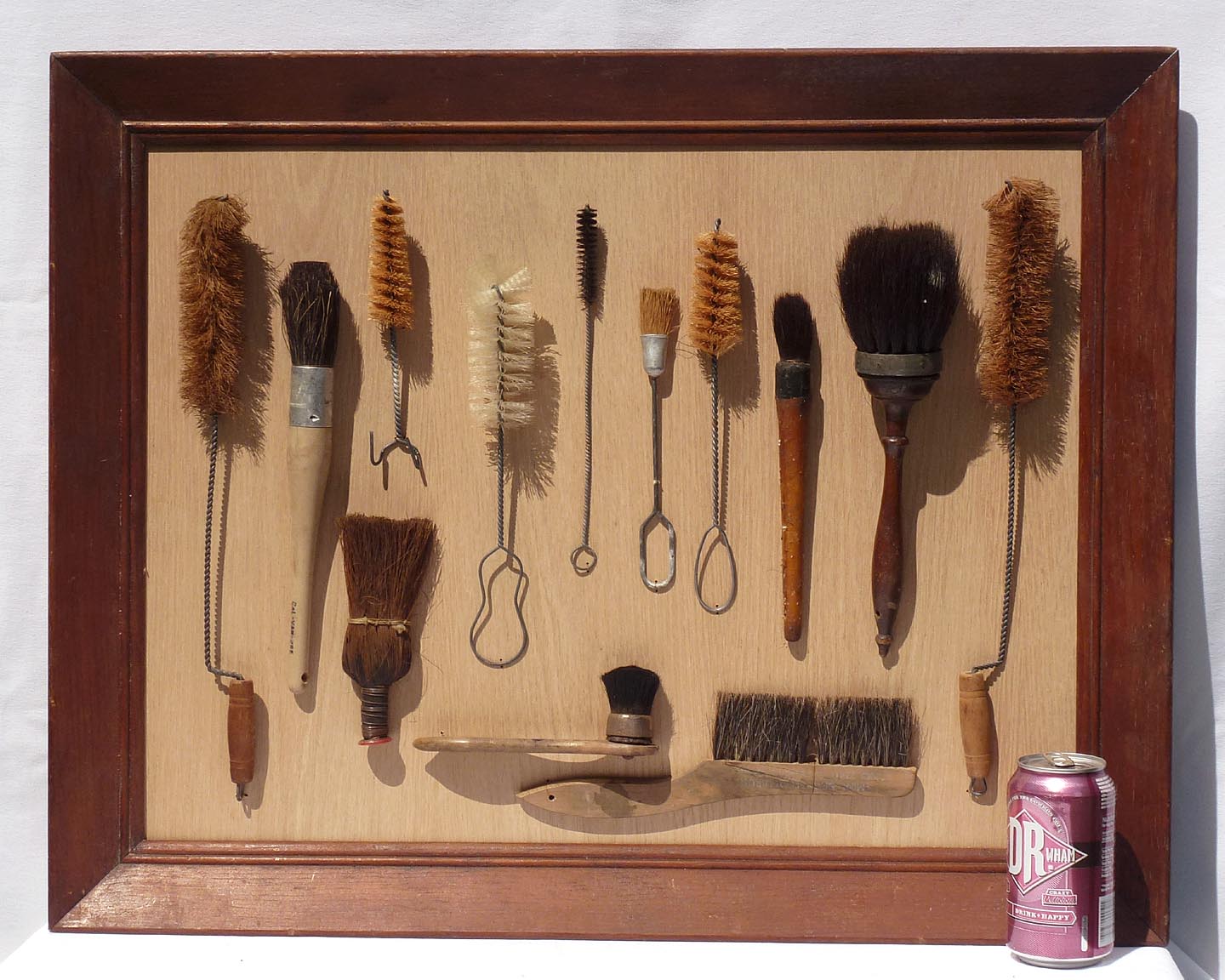 Framed collection of brushes