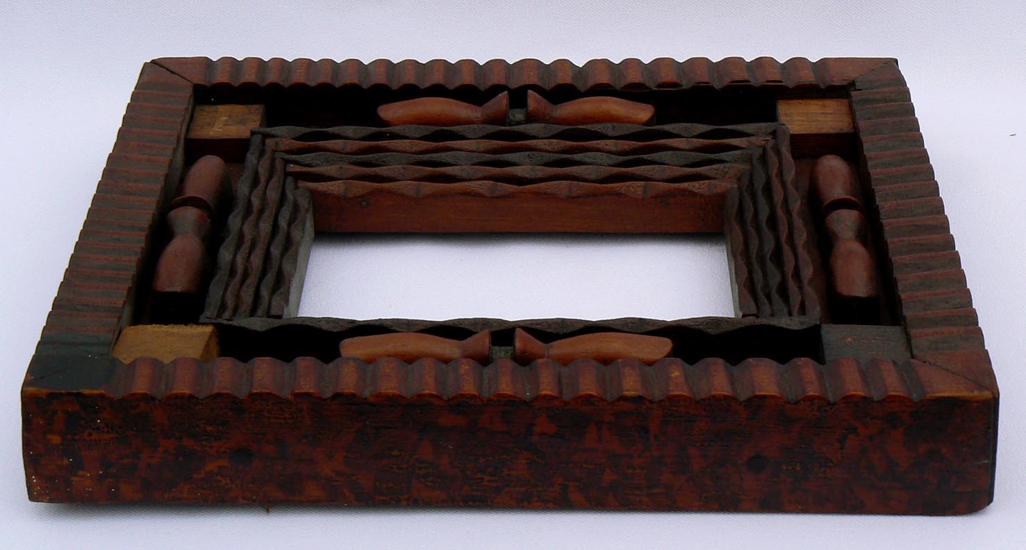 Tramp art frame