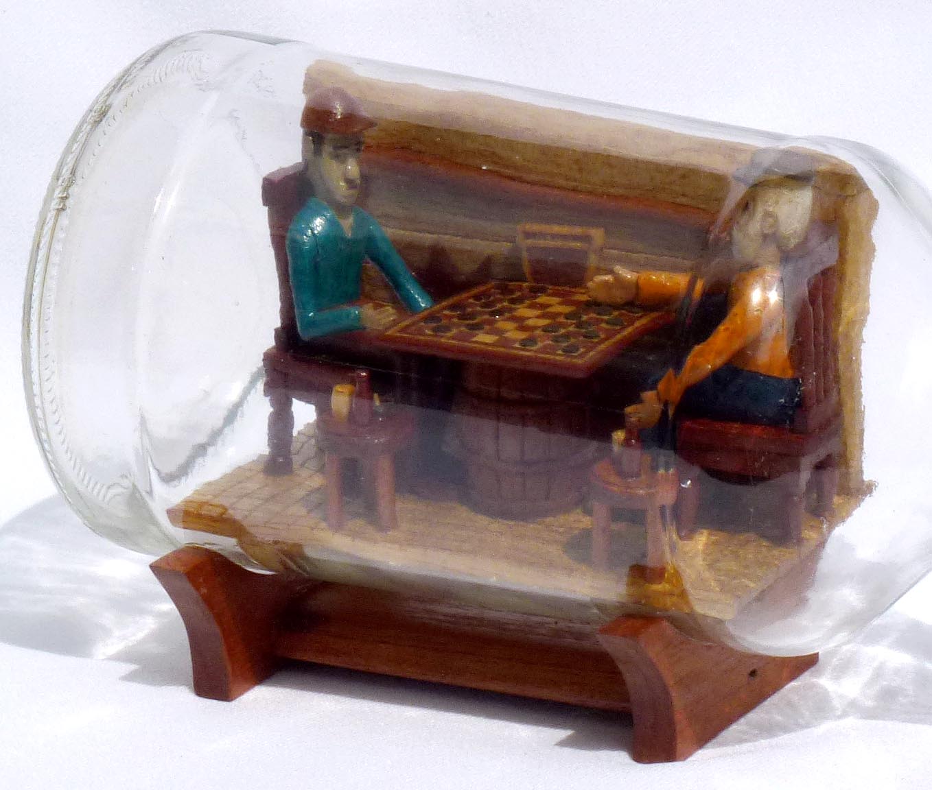 Intricate Bottle Whimsey of Men Playing Checkers