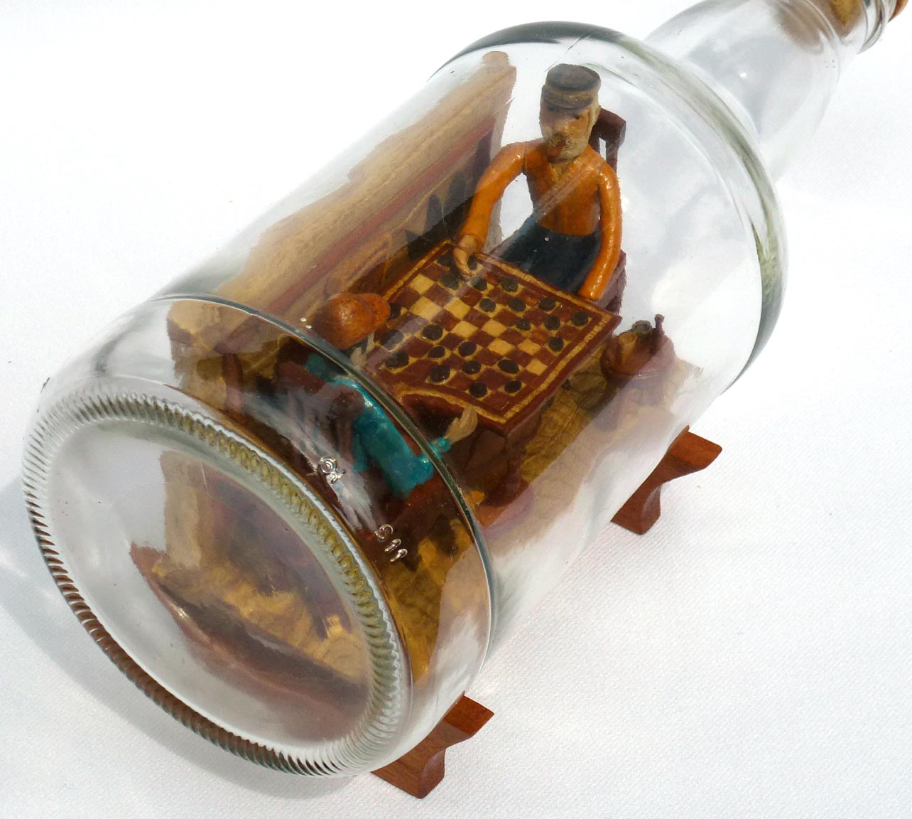 Intricate Bottle Whimsey of Men Playing Checkers
