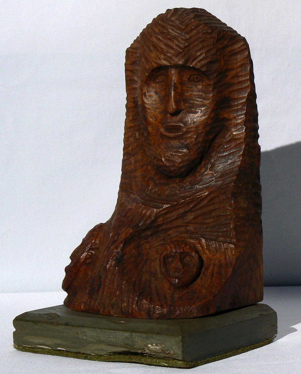 Carved bust on stone base