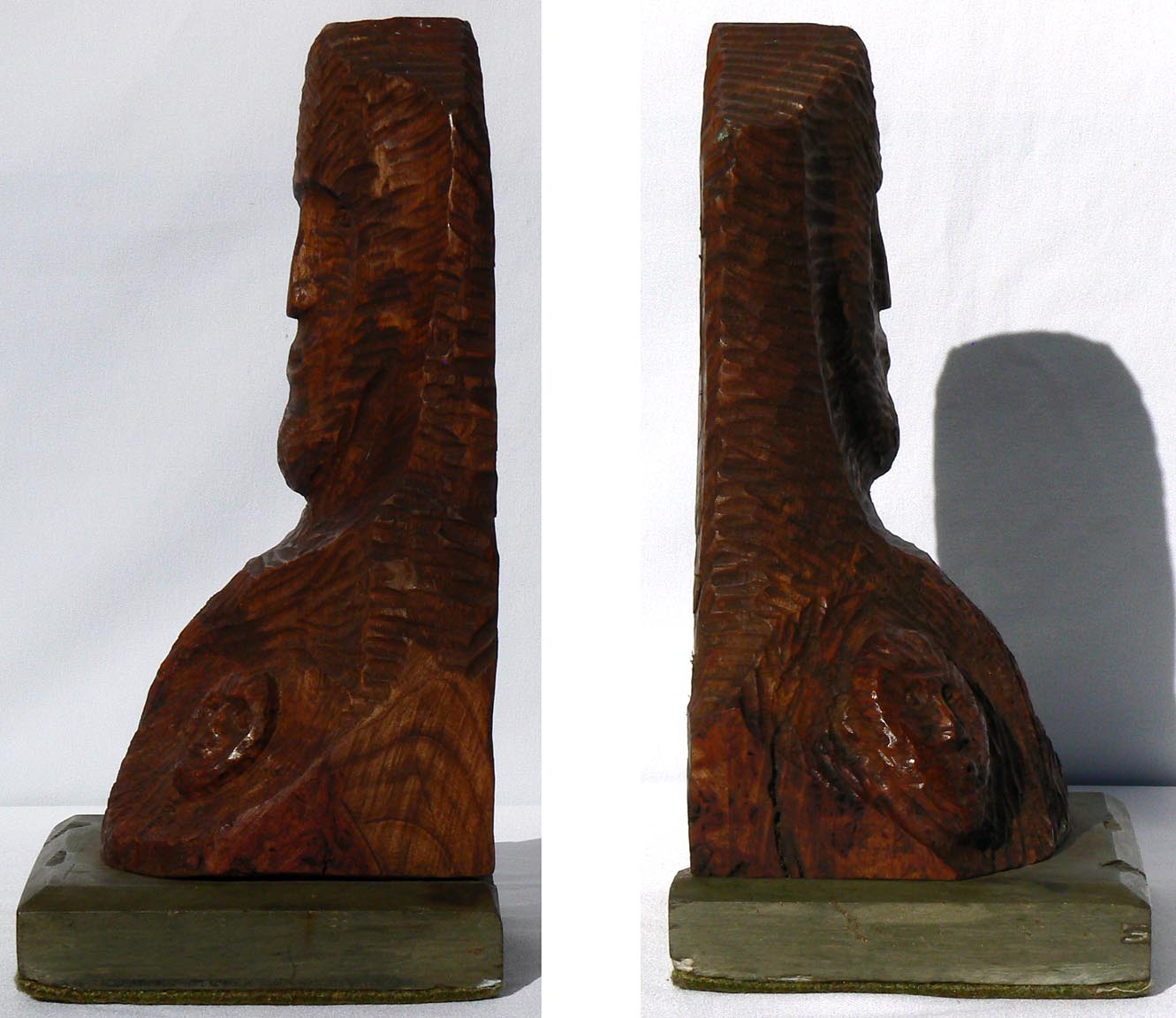 Carved bust on stone base