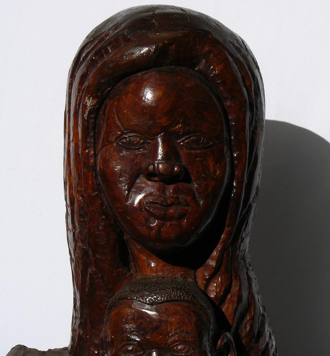 African-American carving of mother and children