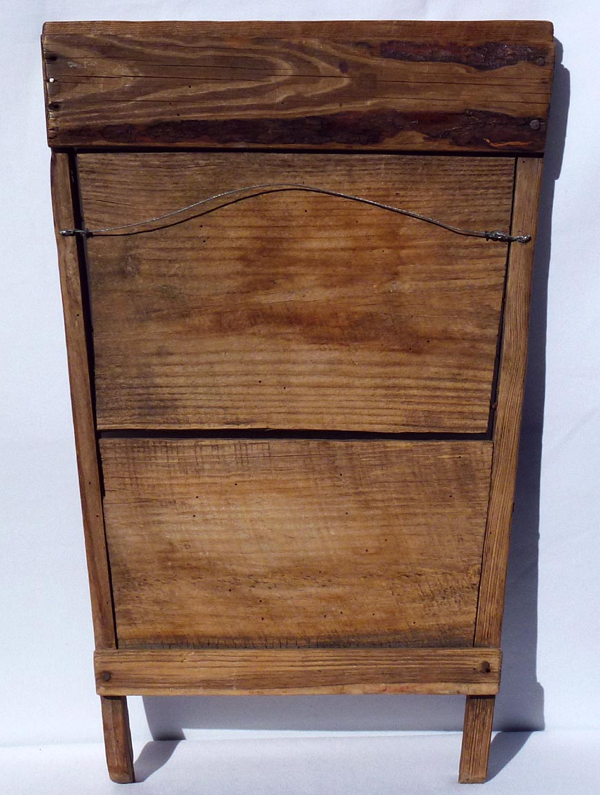 Primitive hand made wooden washboard