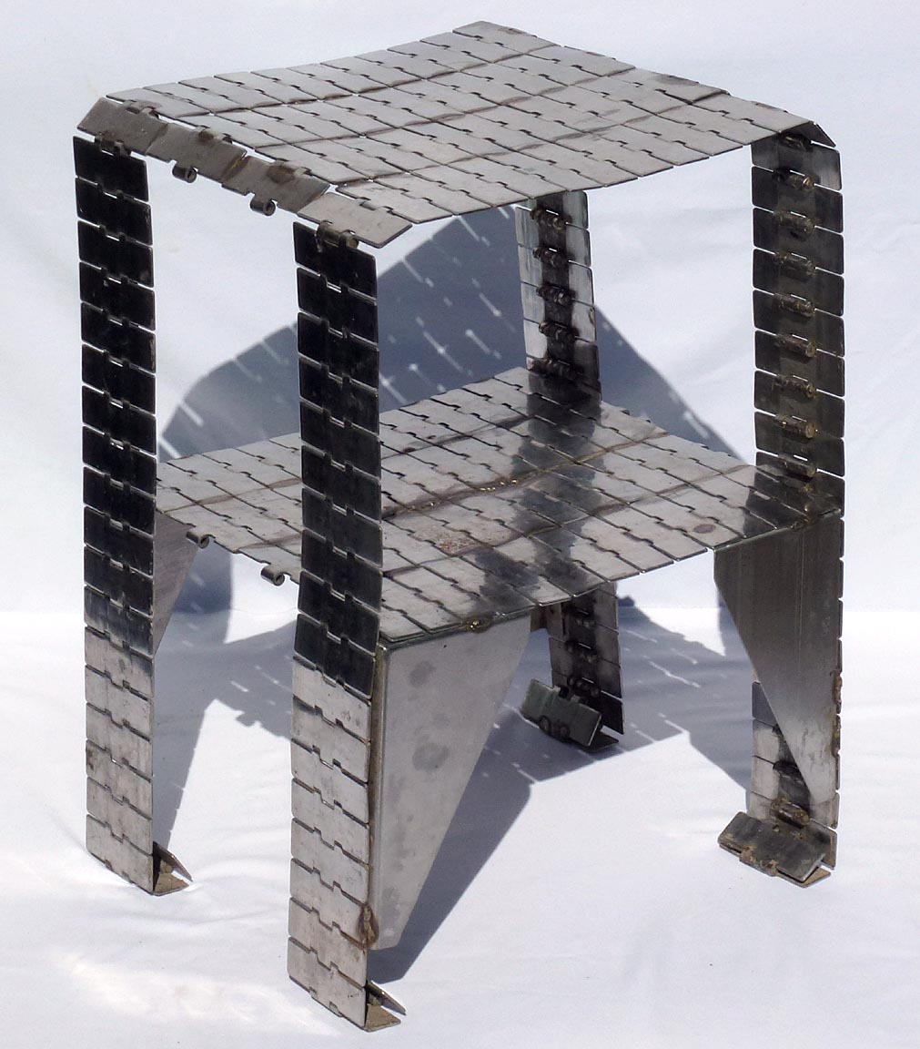 Metal table made from industrial conveyor belt