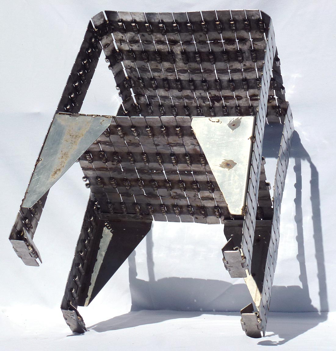 Metal table made from industrial conveyor belt