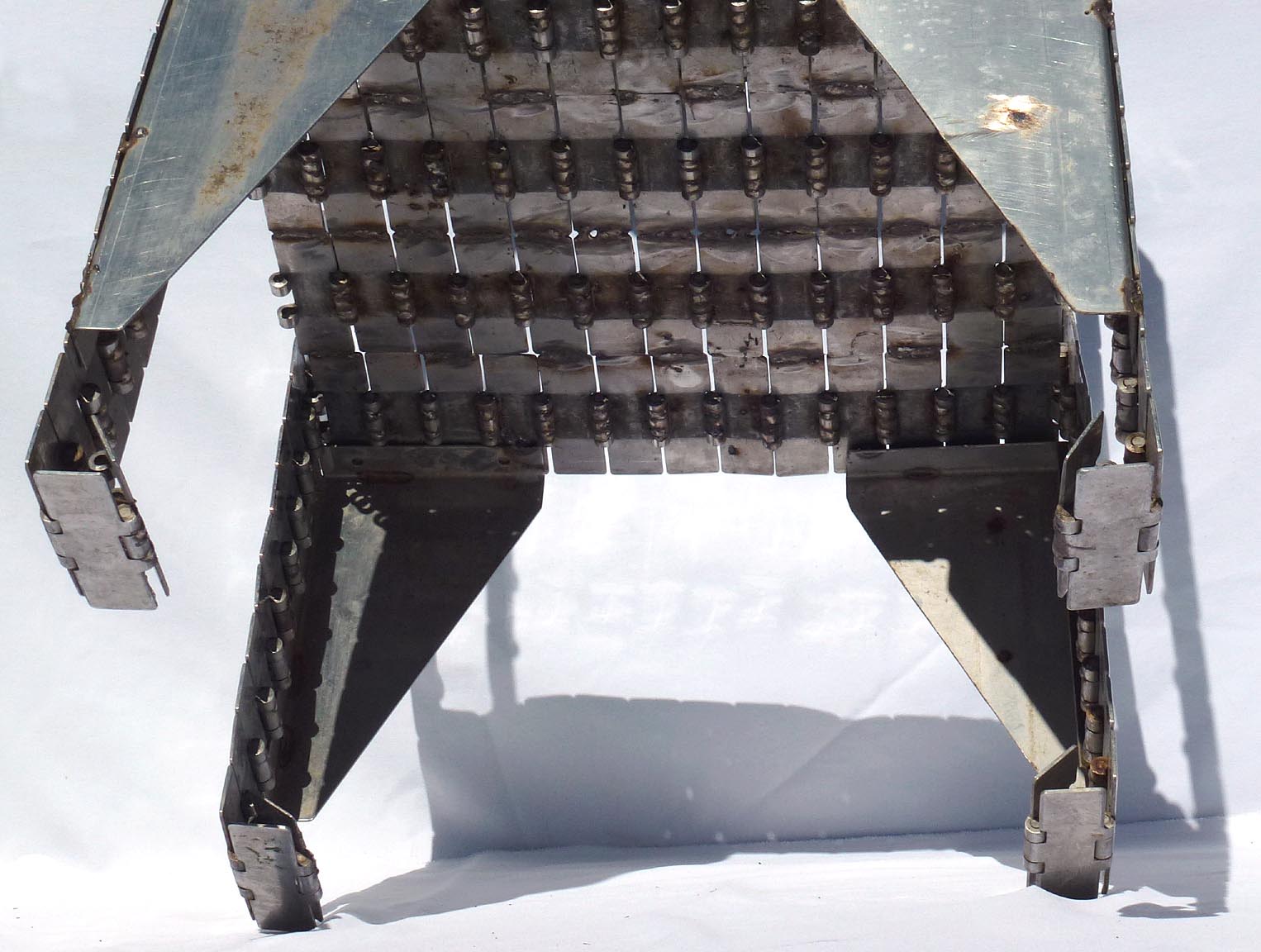 Metal table made from industrial conveyor belt