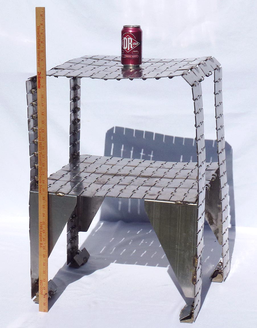 Metal table made from industrial conveyor belt