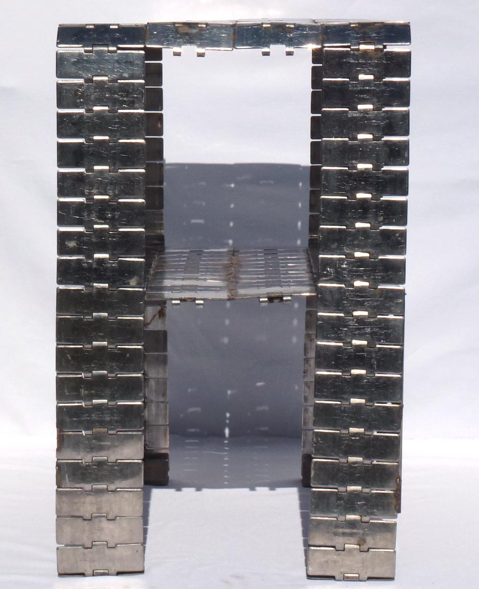 Metal table made from industrial conveyor belt