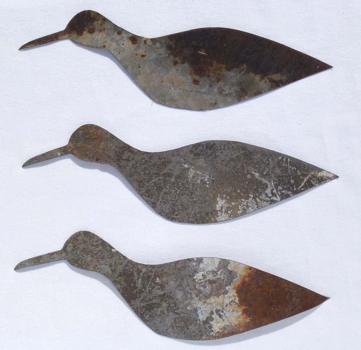 Three metal birds