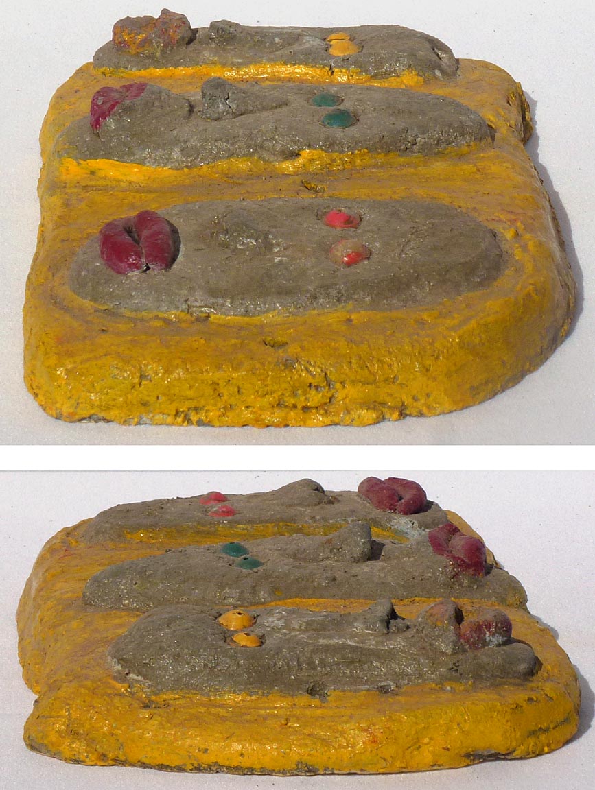 Outsider art concrete faces