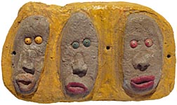 Outsider art concrete faces