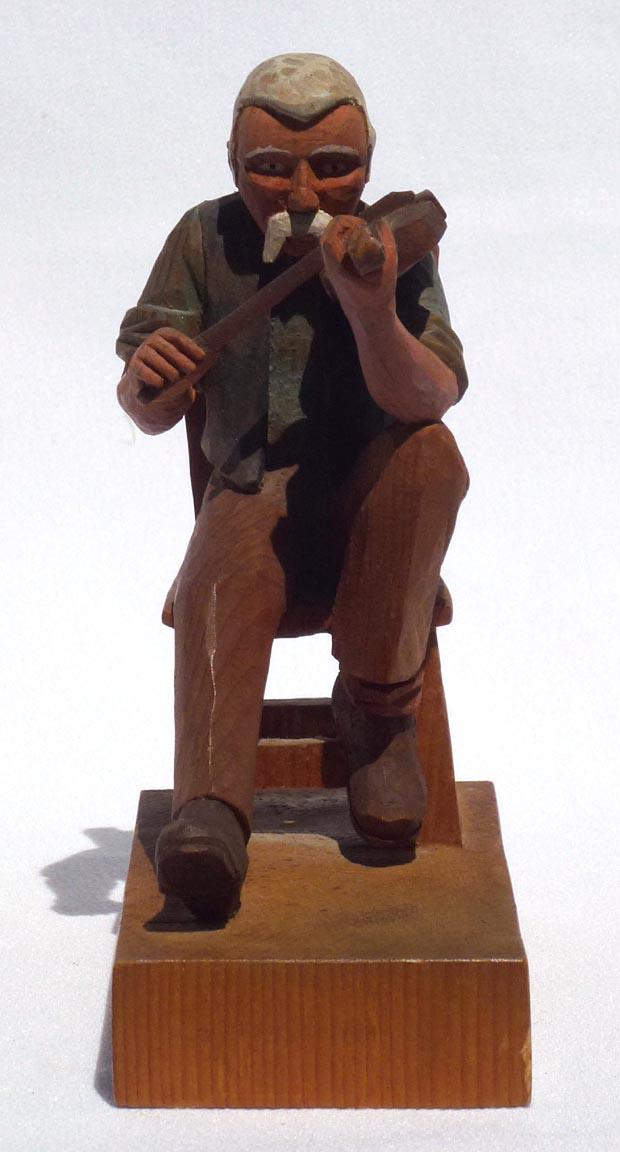 Carving of fiddler