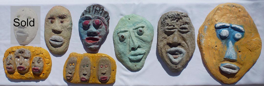 Outsider art concrete faces