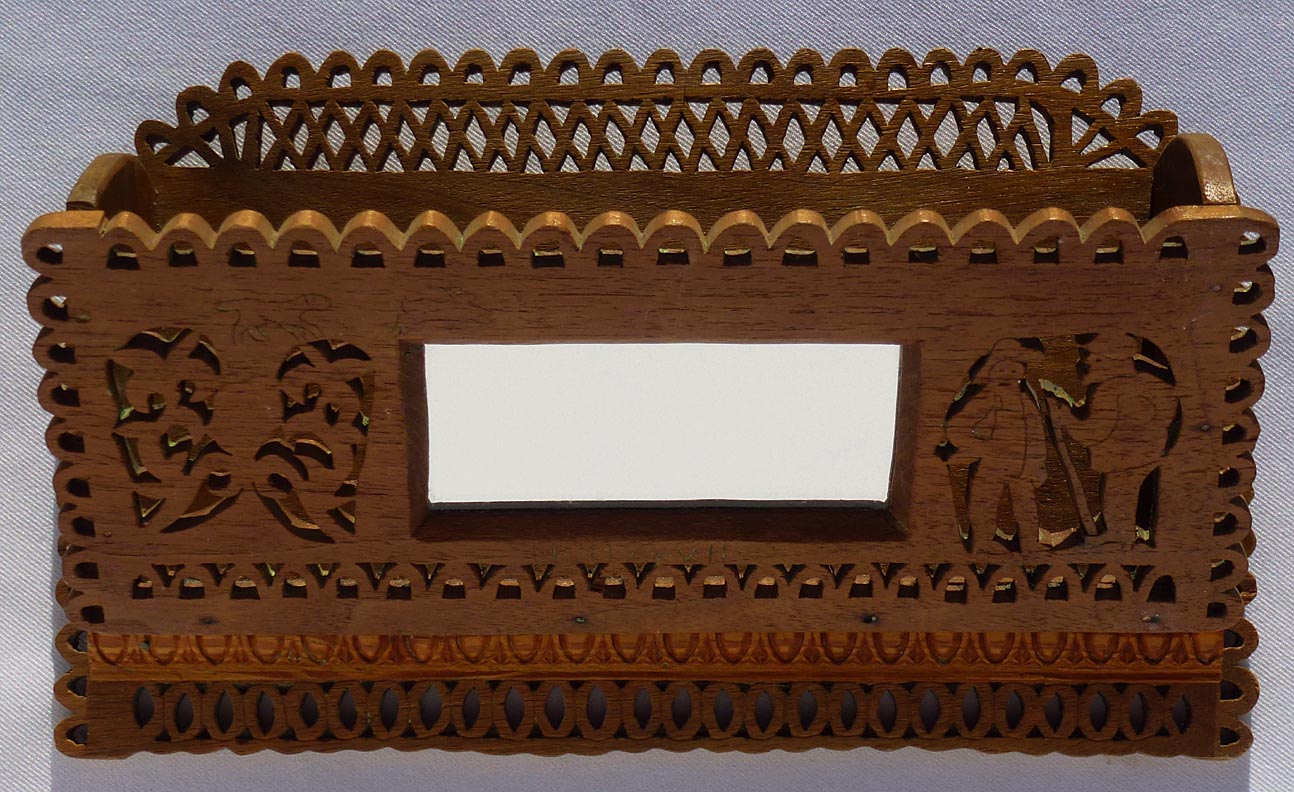 Carved fretwork comb case