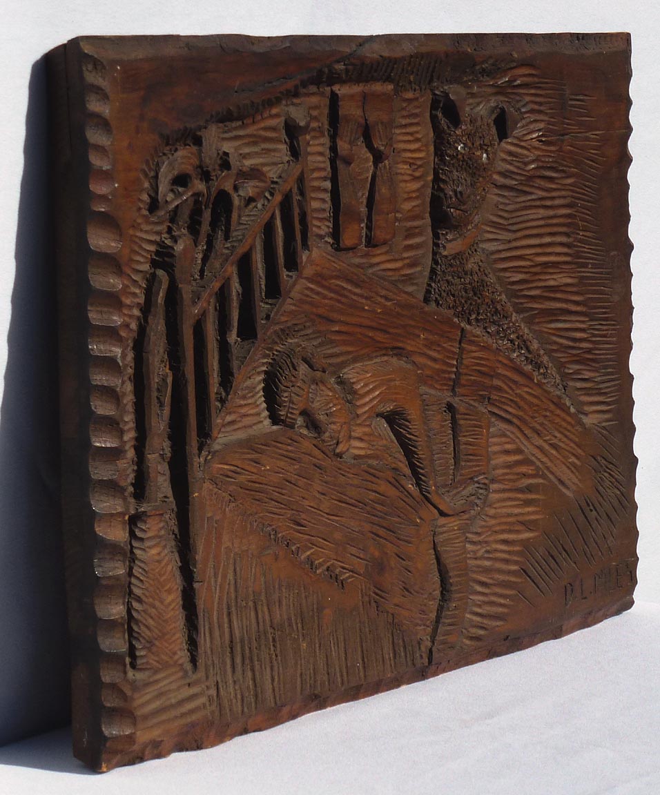 Carving of sleeping man with dog