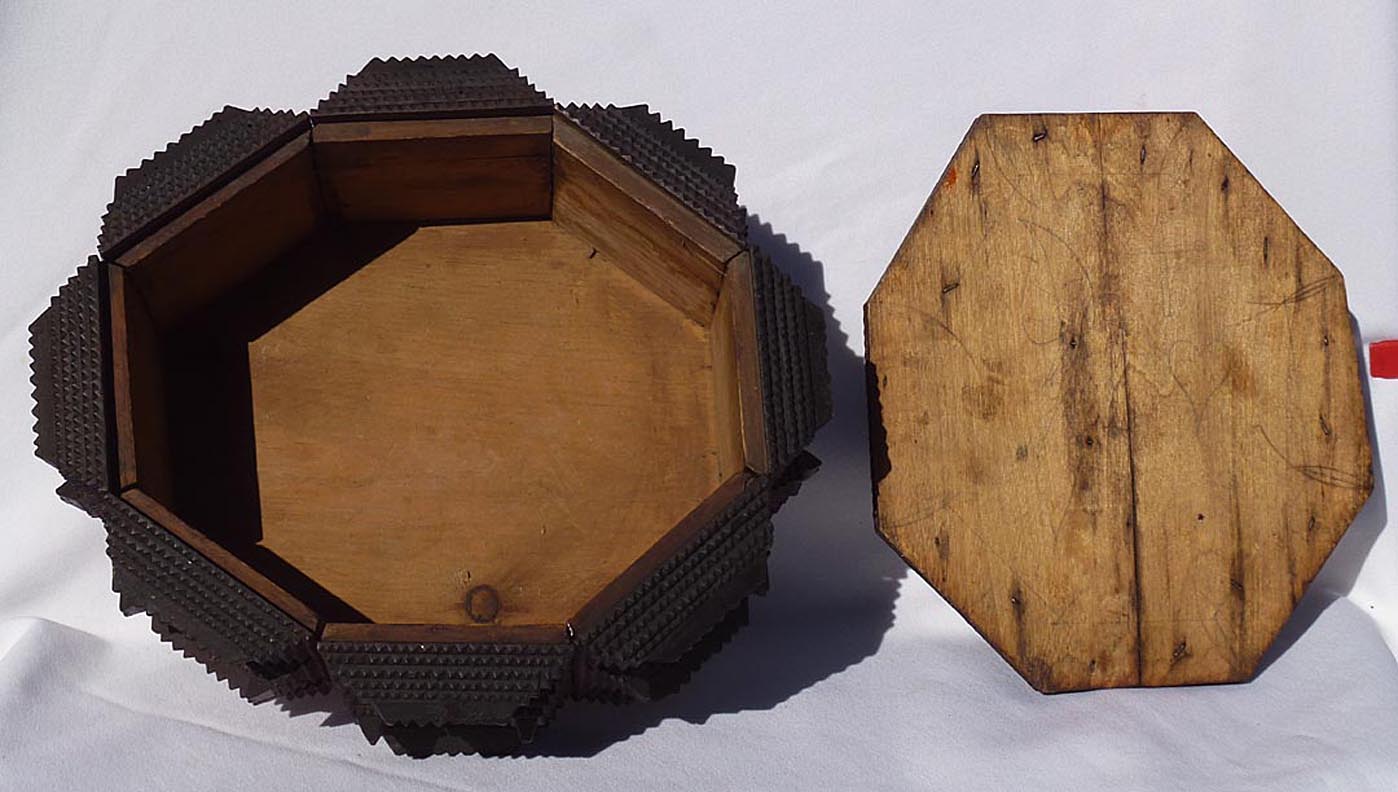 Octagonal tramp art box with leaves