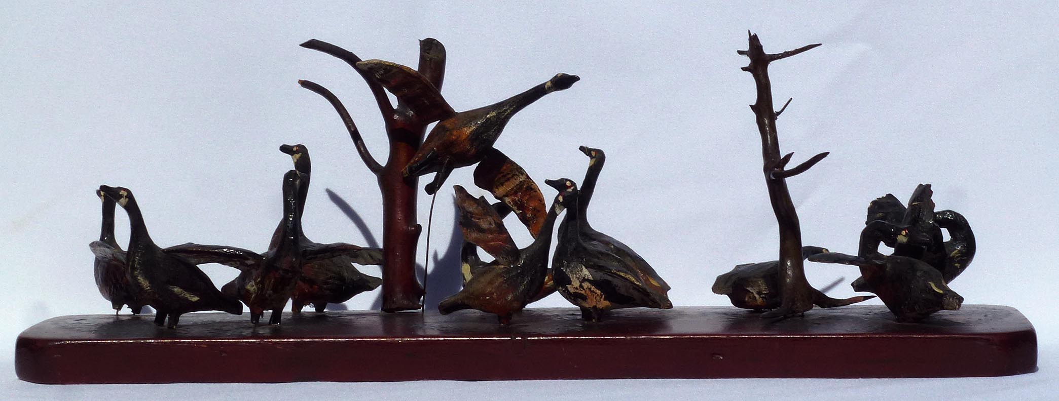 Assemblage of carved geese