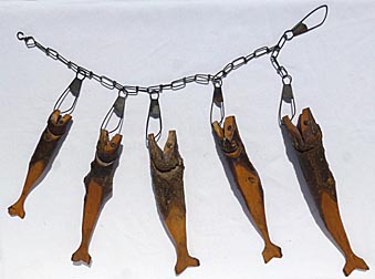 Carved fish on a stringer