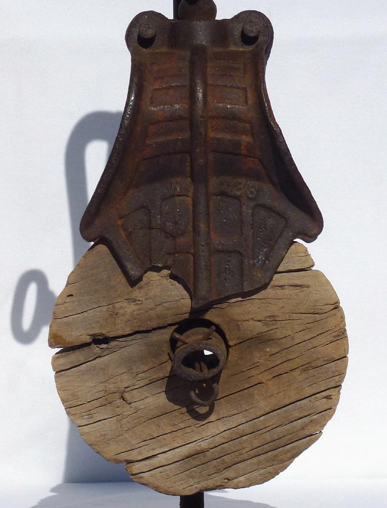 Wood and metal pulley